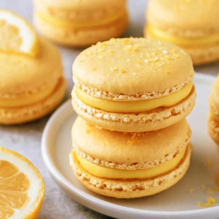 Delicious lemon macarons filled with creamy ganache.